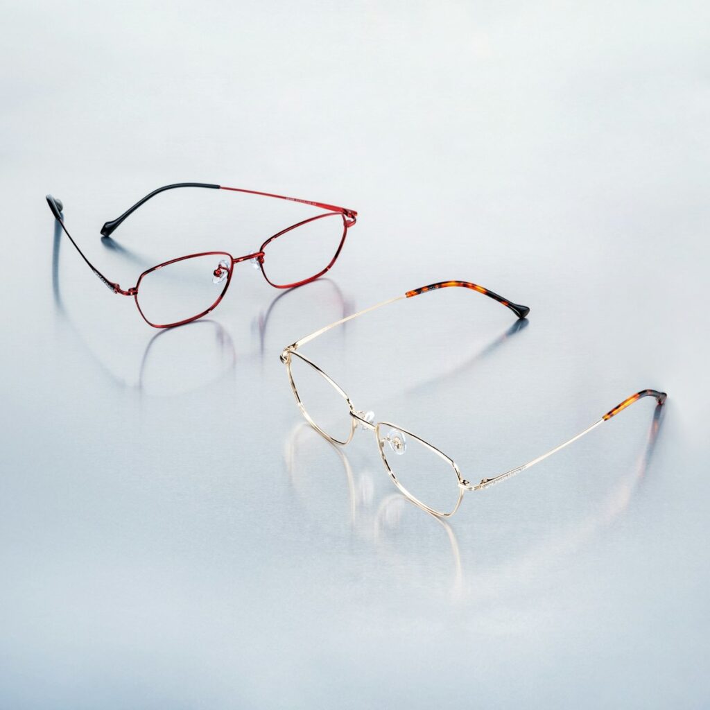 A pair of glasses sitting on top of a cloud filled sky