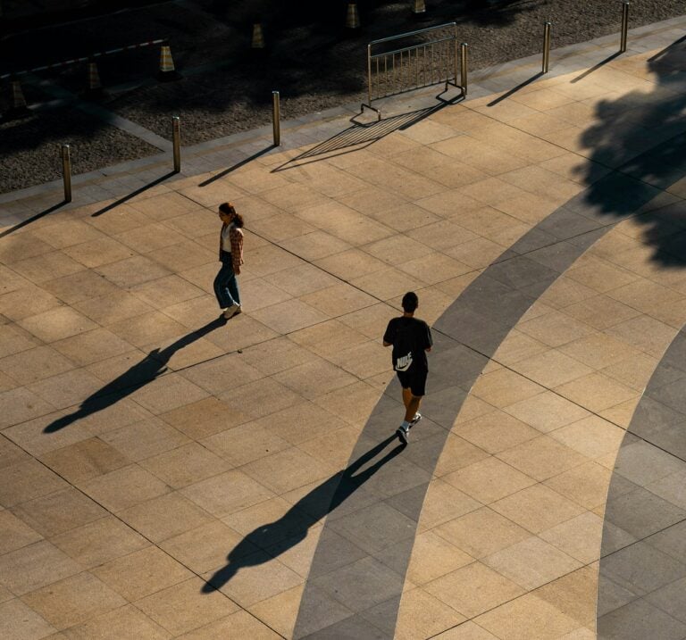 A couple of people that are walking around