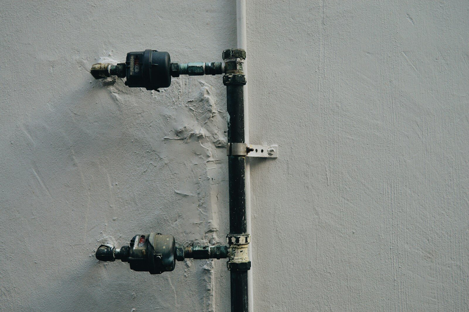 black and gray metal pipes